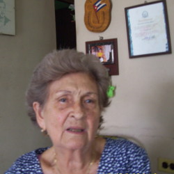 Esther no esconde su fe religiosa ni su vocación por Fidel. Foto:Enrique Atiénzar Rivero/Adelante 