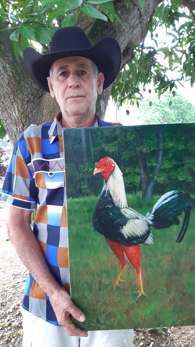  El premio por la obra de la vida de Roberto Almanza incluyó una pintura de Yaimel Castañeda.